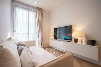 Modern living room with sleek TV setup and elegant decor