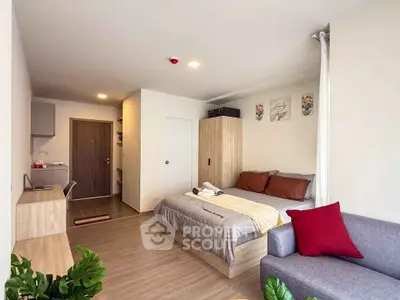 Modern studio apartment with cozy bedroom and stylish decor