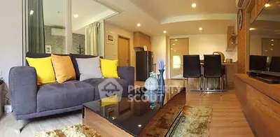 Modern living room with stylish decor and open layout in a contemporary apartment.