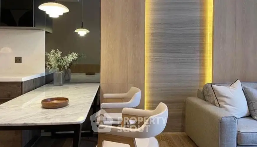 Modern living room with elegant lighting and stylish furniture