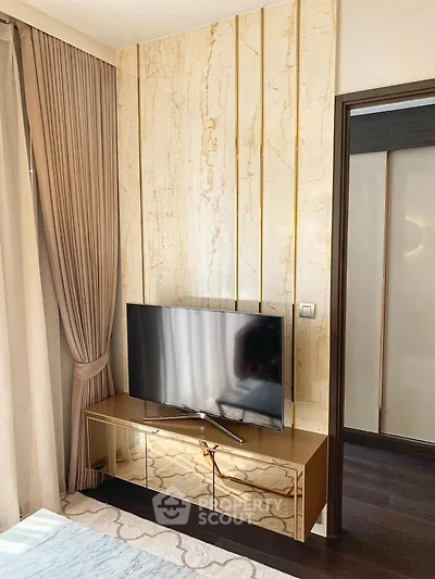 Luxurious living room with elegant TV setup and stylish decor