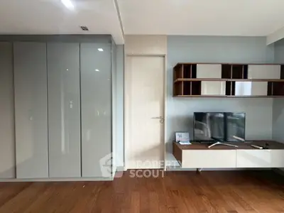 Modern living room with sleek TV unit and stylish storage solutions
