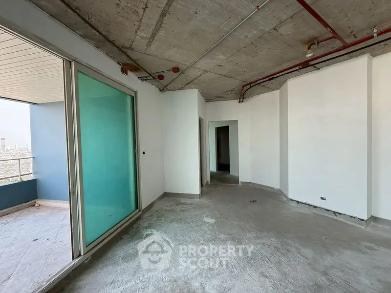 Spacious unfinished apartment with balcony and city view