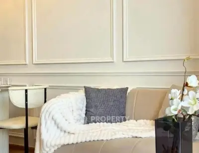 Elegant living room with chic decor and cozy seating area