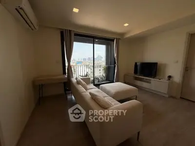 Modern living room with balcony view in a stylish apartment