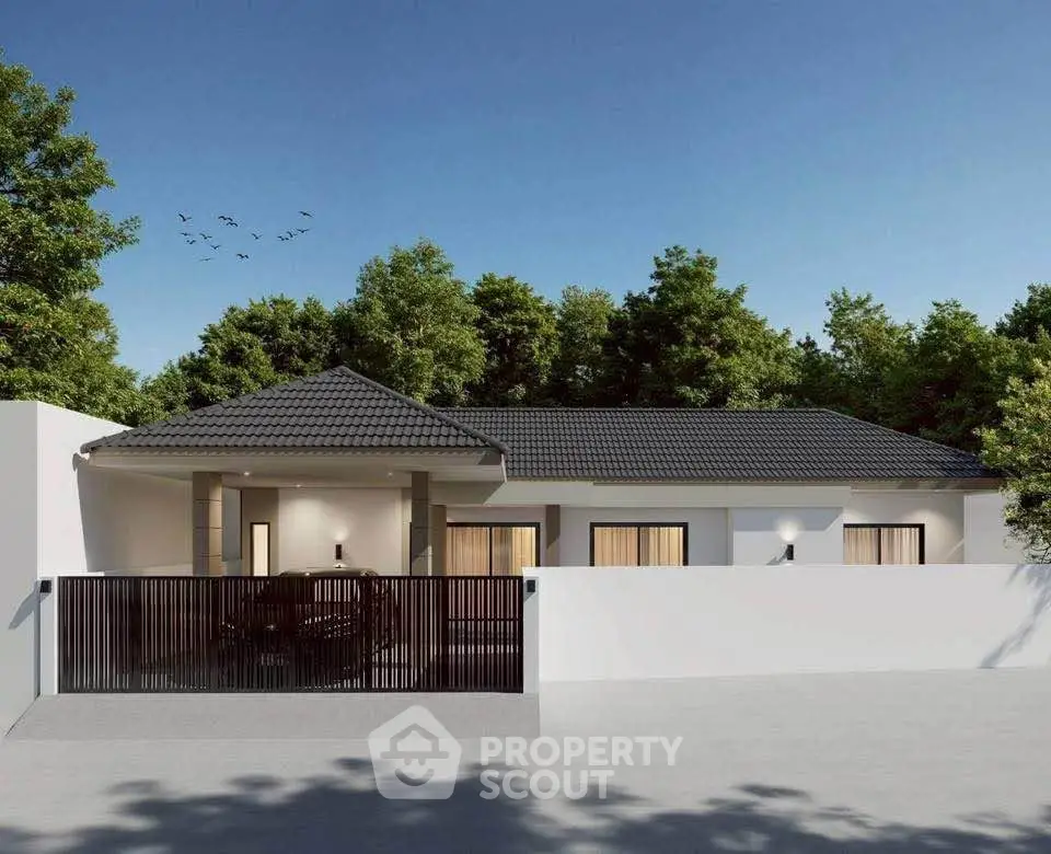 Modern single-story house with sleek design and spacious driveway, surrounded by lush greenery.