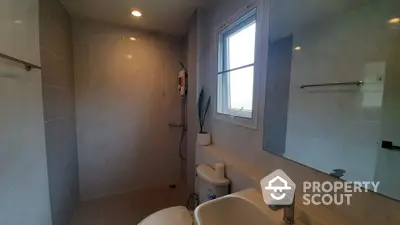 Modern bathroom with sleek fixtures and natural light