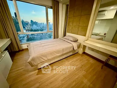 Modern bedroom with city view and stylish decor