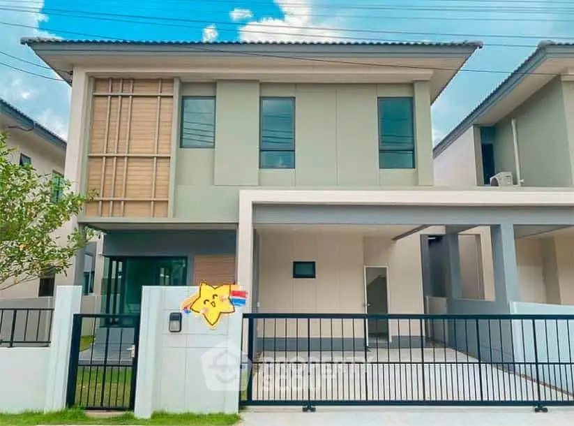 Modern two-story house with sleek design and spacious driveway