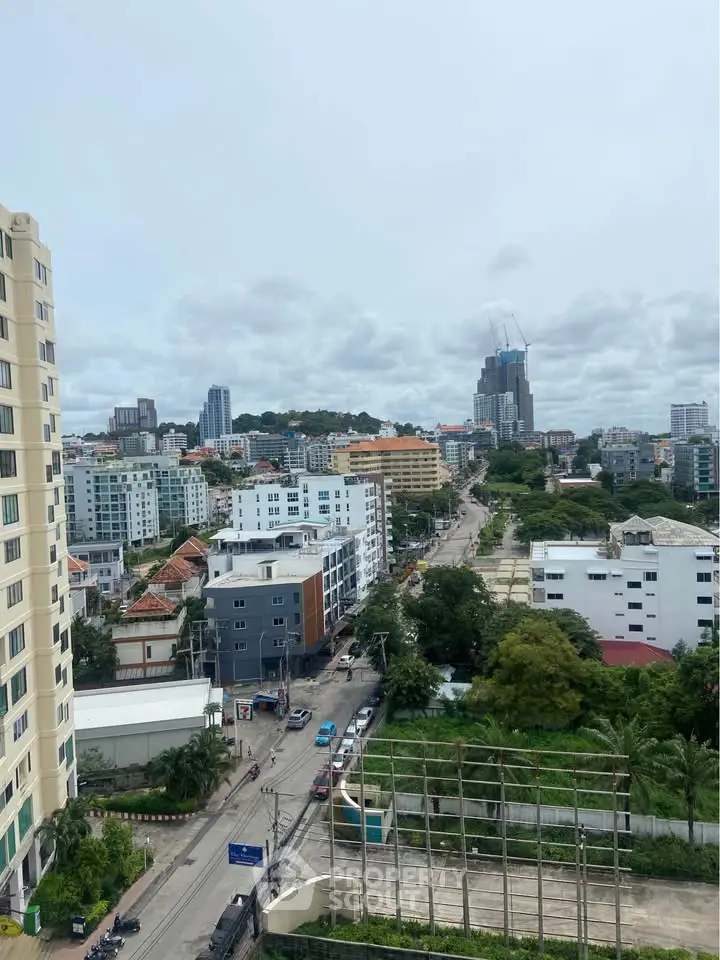 Stunning cityscape view from high-rise building showcasing urban living and skyline.
