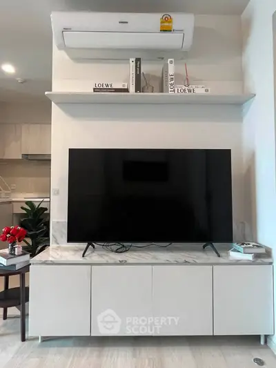 Modern living room with sleek TV setup and stylish decor