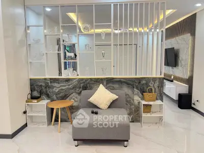 Modern living room with stylish decor and elegant marble accents