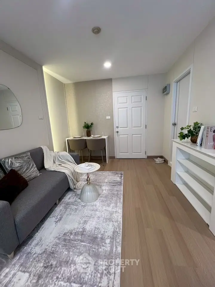 Modern living room with stylish decor and cozy seating area