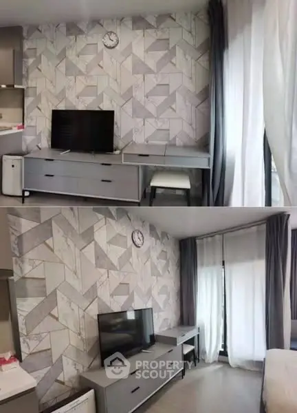 Modern living room with stylish geometric wall design and sleek furniture