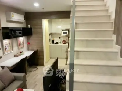 Modern duplex apartment with stylish interior and compact kitchen