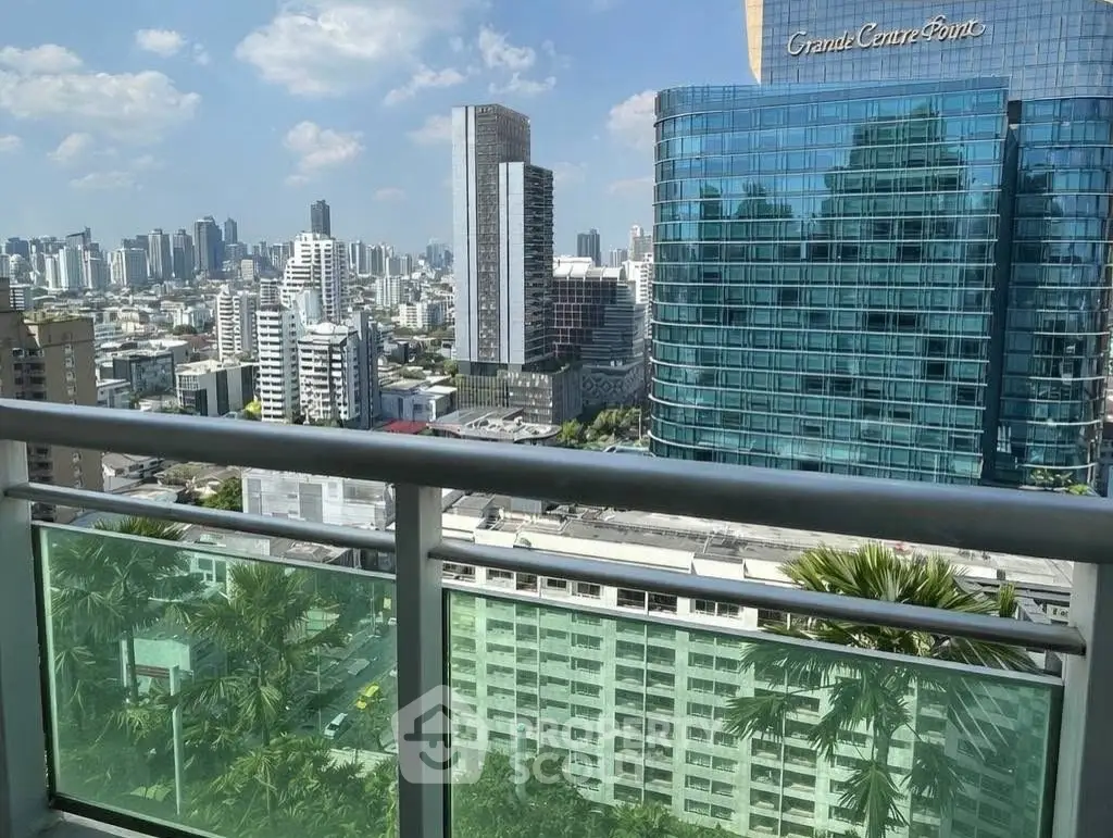Stunning cityscape view from a modern balcony in a high-rise building, perfect for urban living.