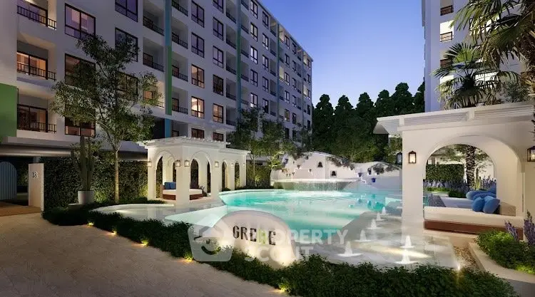 Luxurious apartment complex with stunning pool and elegant outdoor seating area.