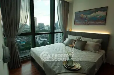 Luxurious bedroom with stunning city view and elegant decor