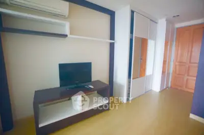 Modern living room with sleek TV stand and built-in storage
