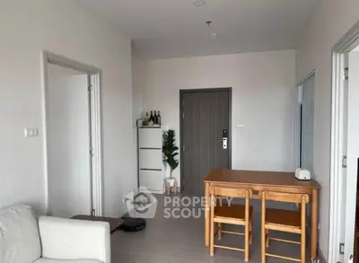 Modern apartment interior with minimalist furniture and wooden dining set