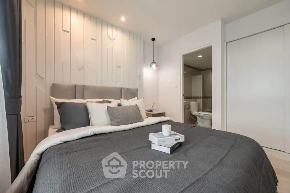 Modern bedroom with cozy bedding and stylish decor