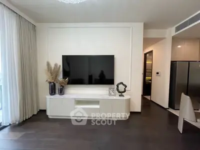 Modern living room with sleek TV setup and elegant decor