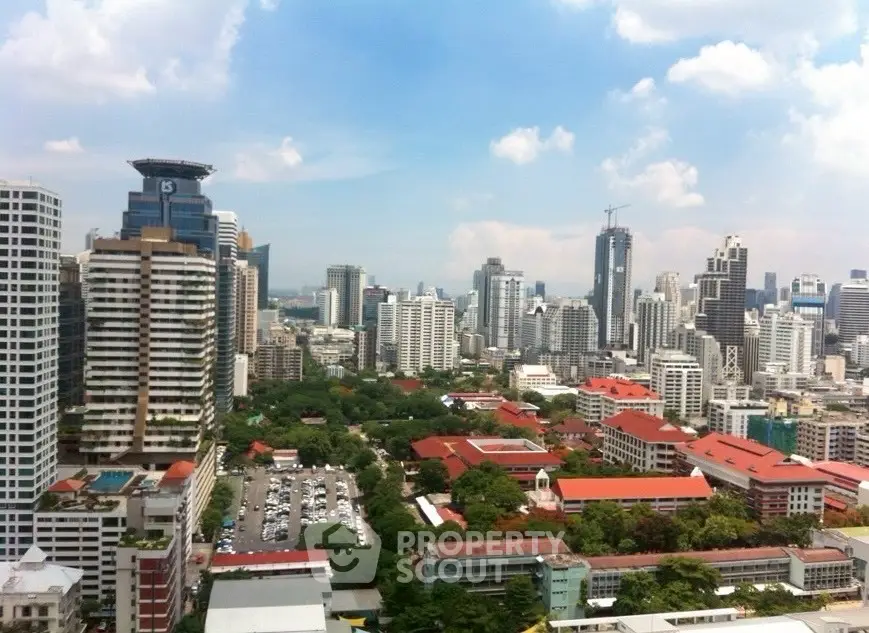 Stunning cityscape view showcasing modern skyscrapers and lush greenery, perfect for urban living enthusiasts.