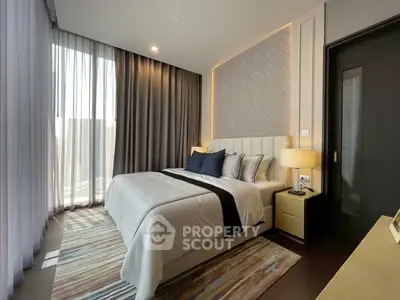 Luxurious modern bedroom with elegant decor and large window view