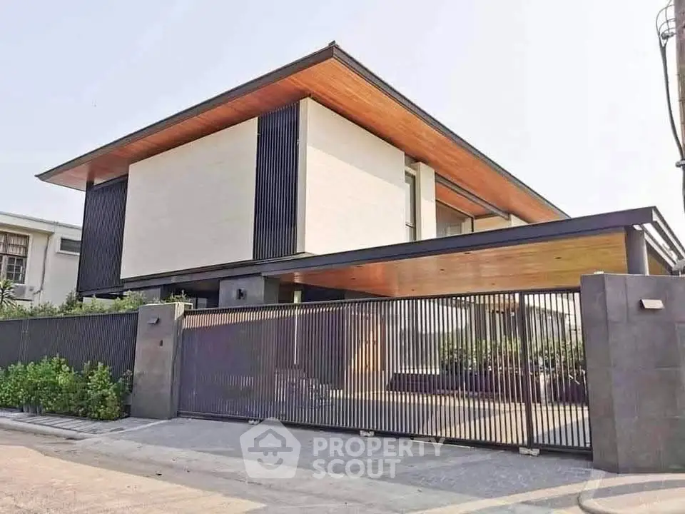 Modern luxury home with sleek design and spacious driveway