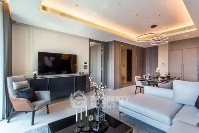 Luxurious modern living room with elegant decor and ambient lighting