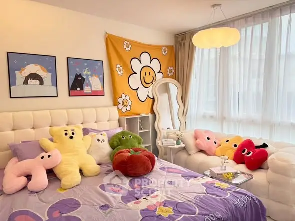 Charming bedroom with plush decor and ample natural light