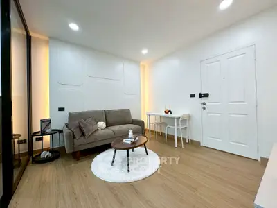 Modern living room with cozy sofa and stylish decor