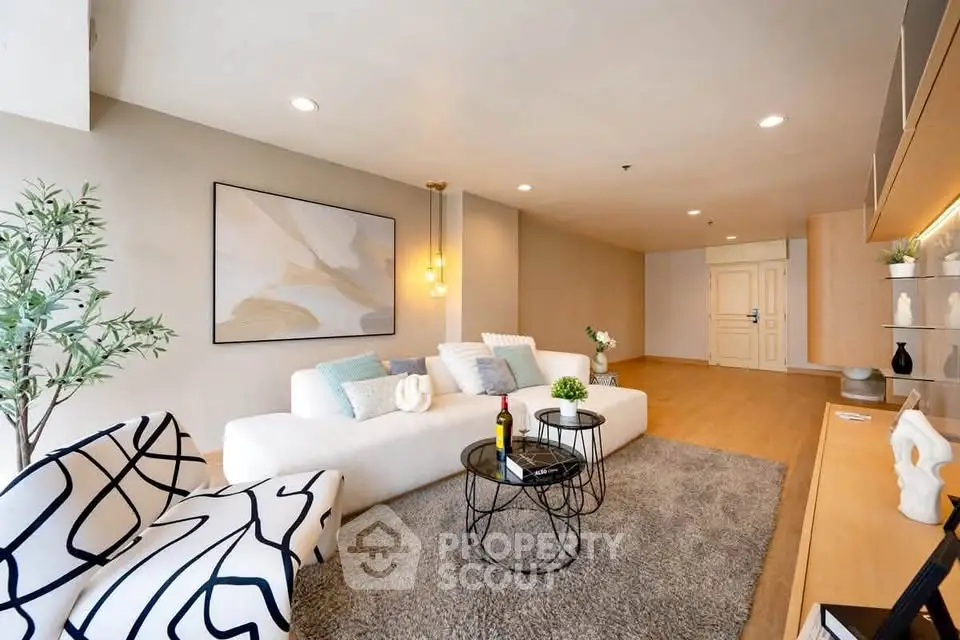 Spacious modern living room with stylish decor and cozy seating area