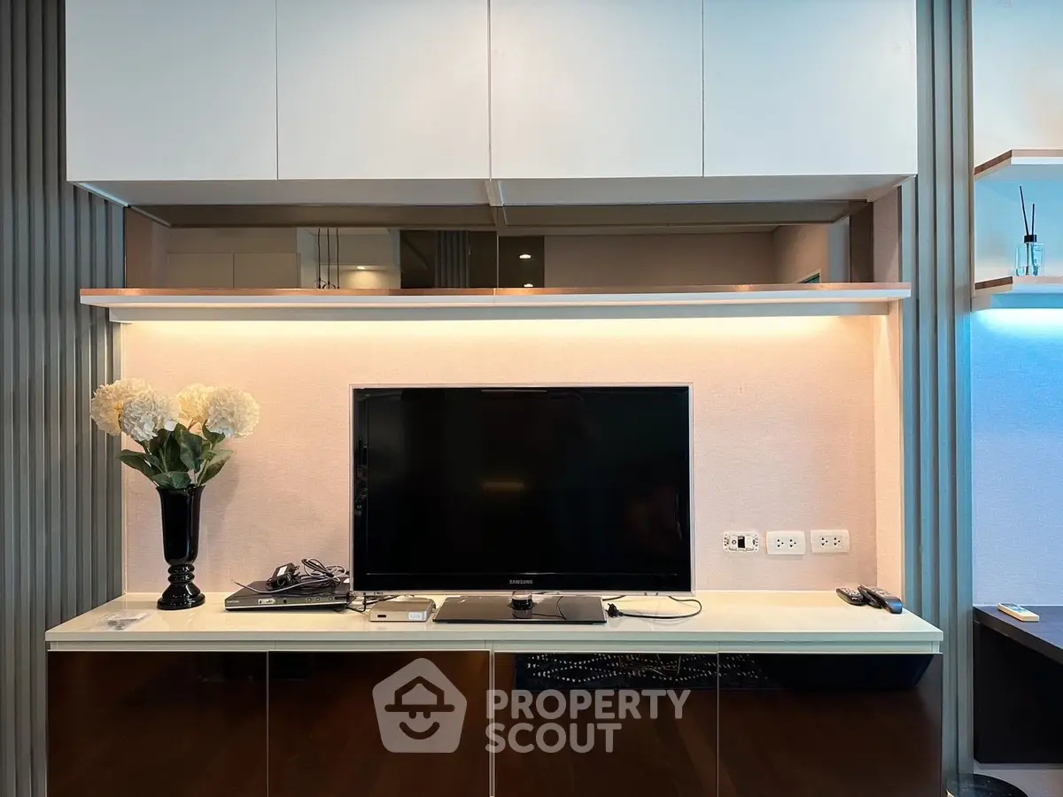 Modern living room with sleek TV setup and elegant decor
