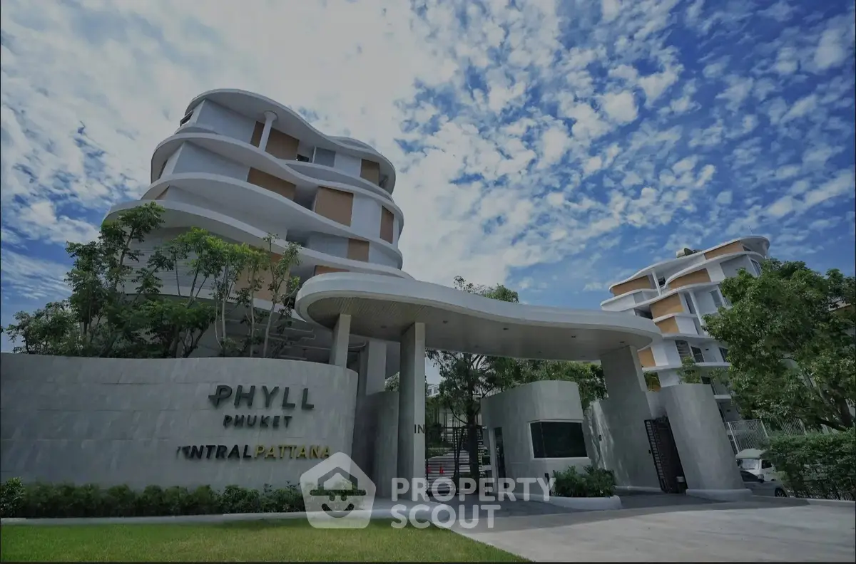 Modern architectural building with unique design and lush greenery in a vibrant neighborhood.