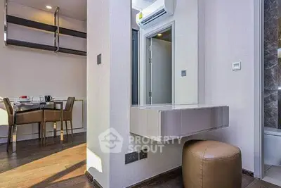Modern apartment interior with dining area and vanity setup