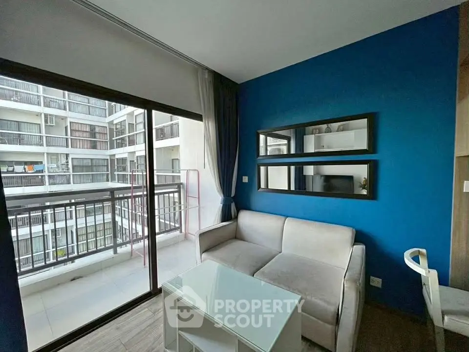 Modern living room with balcony view in a stylish apartment