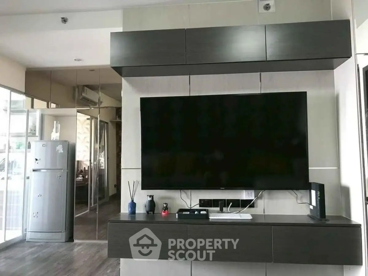 Modern living room with sleek TV setup and stylish decor