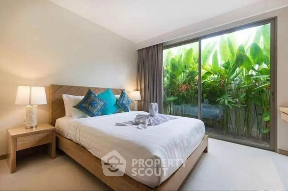 Luxurious bedroom with garden view and elegant decor