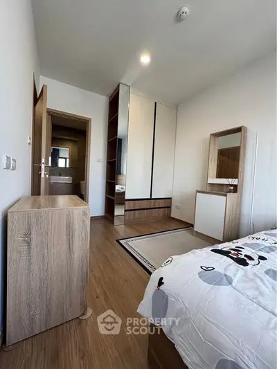 Modern bedroom with wooden furniture and stylish decor