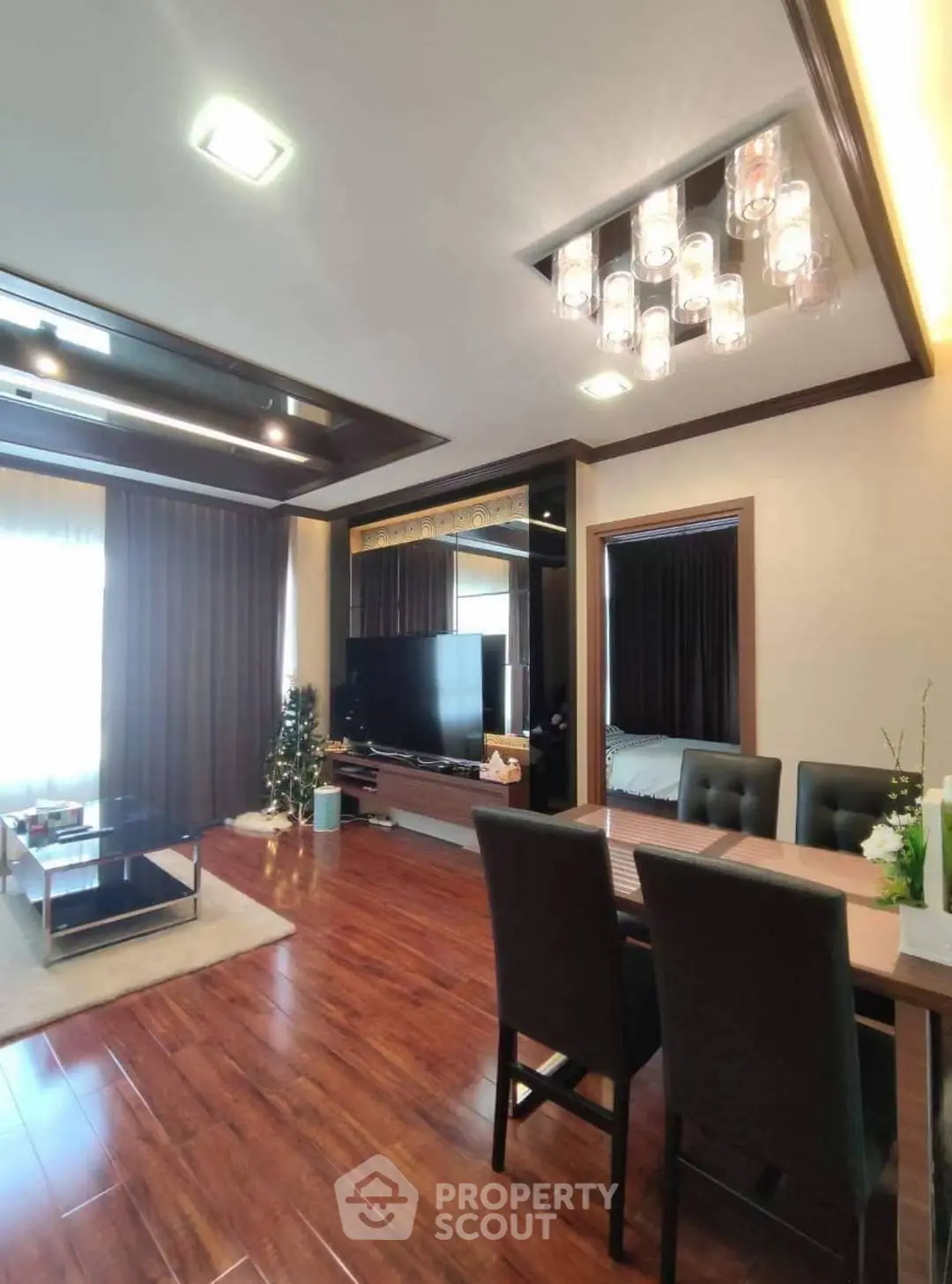 Luxurious living room with elegant dining area and modern lighting