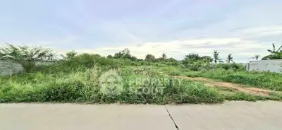 Expansive plot of land with lush greenery, perfect for development opportunities.
