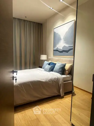 Cozy modern bedroom with elegant decor and soft lighting