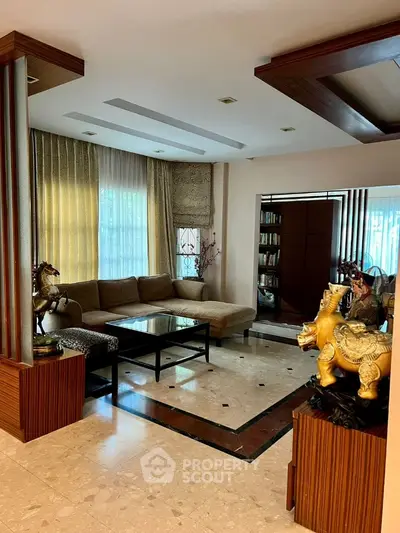 Luxurious living room with elegant decor and spacious seating area