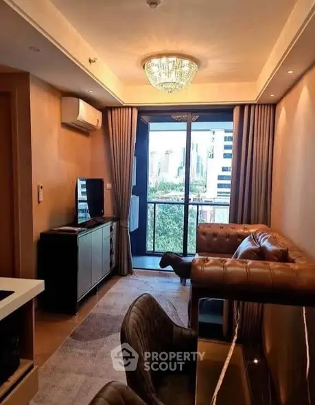 Luxurious living room with elegant decor and city view balcony in modern apartment.