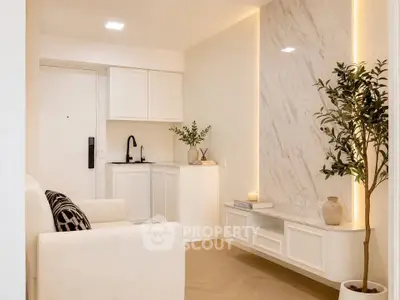 Elegant modern living room with marble accent wall and cozy seating area