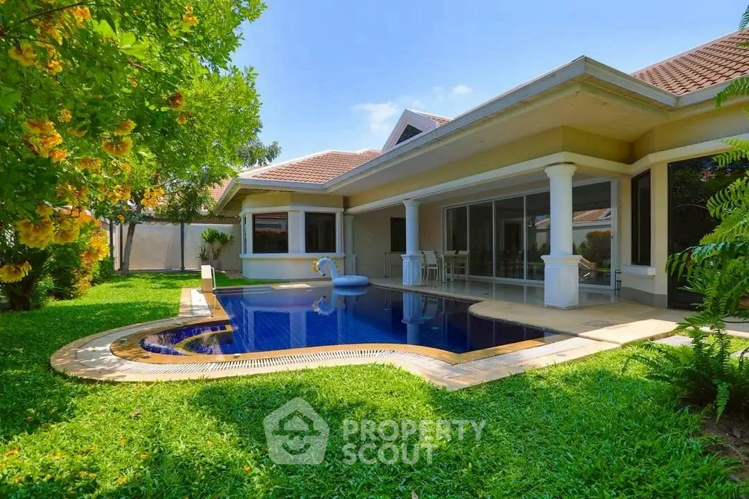 Luxurious villa with private pool and lush garden, perfect for serene living.