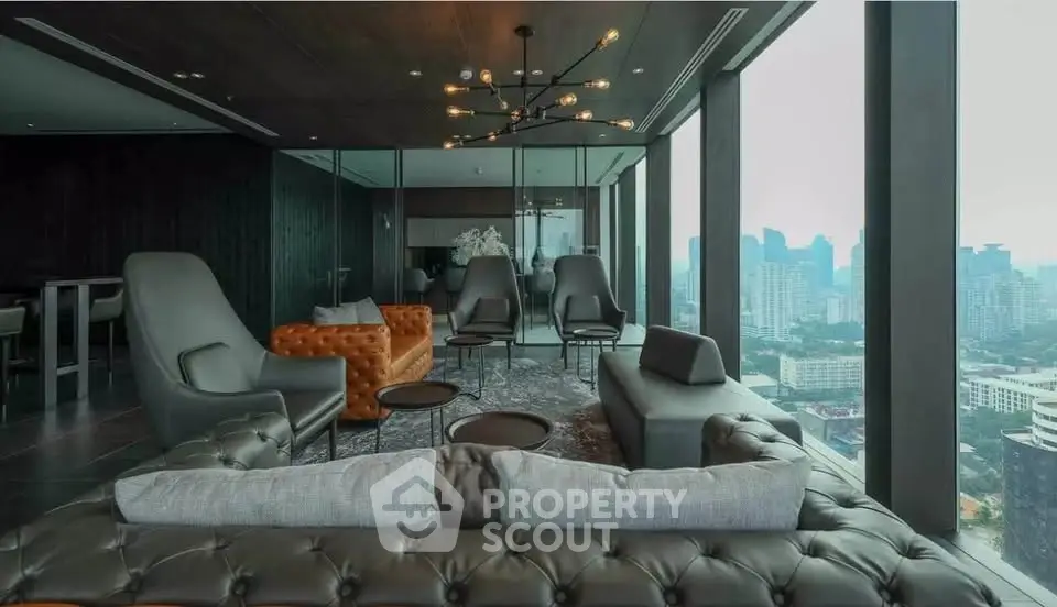 Luxurious modern living room with panoramic city views and stylish furniture.