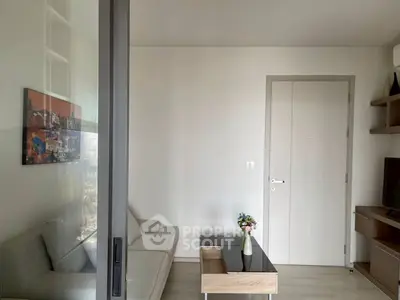 Modern living room with sleek furniture and minimalist decor