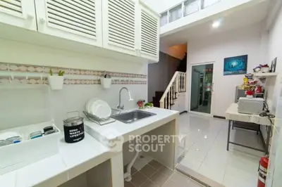Charming kitchen with open layout and modern appliances in cozy home